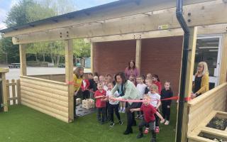 Lisa Corby and pupils at the ribbon cutting ceremony.