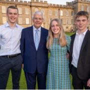 Sir John Major pictured with students from Kimbolton School.