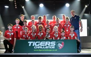 Former England rugby captain Martin Johnson with the cup-winning St Neots rugby under 11s team and coaches.