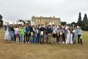 Kimbolton students celebrating their A-level results in front of the Castle