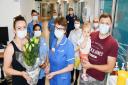 The patient's son Mateusz, Mateusz’s wife Monika, and their daughter Emilia, presented Claire with flowers to say thank you.