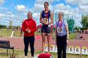 Hunts AC youngster Willow Bedding (left) won silver in the hammer at the England U15/U17 Championships