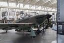 A Hawker Hurricane on display in The Battle of Britain Exhibition in Hangar 4 at IWM Duxford . Picture: IWM