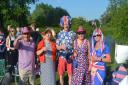 Spectators pitched up at the Regatta Fields in Hemingford Abbots in fancy dress to watch the flotilla.