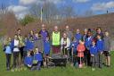 Members of Huntingdon and Huntingdon Cromwell Rotary clubs help the children of St Johns primary school plant 165 saplings.