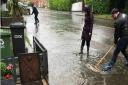 Residents in Buckden tackle floods earlier this year - is it too long to wait until 2022?