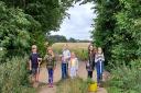 Children joined forces with the Alconbury Brook Flood Group to plant trees. (L to R: Kit, Clara, Darcy, Mia, Leela, and Elsa).