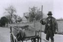 Alfred Rowlett with cart in St Neots. Picture: MUSEUM