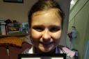 Katie Anne Buckenham with her letter from the Queen. Picture: CONTRIBUTED