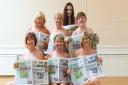Ladies from St Neots use copies of The Hunts Post to cover their modesty. Front row (left to right): Louisa Hewitt, Lynne Otto and Belinda Hicks. Top row (left to right): Gill Brace, Lesley Darlow and Amanda Dibben. Katie Kitson is at the back.