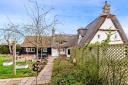 The thatched limewashed Durley Cottage in Wyton is for sale with a guide price of £800,000  Photo: Peter Lane & Partners