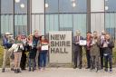 Members of People Opposing Woodhurst Incinerator gathered before the meeting in protest against the plans and presented a petition with 4237 signatures.