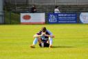 Many St Neots players were disconsolate at the final whistle, which confirmed the team's relegation.
