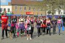 The group of nearly 30 moonwalkers gathered in St Neots Market Square before setting off throughout the town.