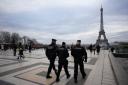 French police investigating a fatal attack near the Eiffel Tower at the weekend are looking into the mental health of the suspect (Christophe Ena/AP)