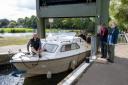 The Anglian Waterways Volunteers help boaters on the River Ouse.