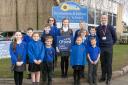 Richard Martin, headteacher of Fenstanton and Hilton Primary School, with members of the School Council.