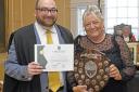 Cllr David Landon Cole, Mayor of Huntingdon (2022-23), awarding the Community Shield to Janet Beveridge from Cromwell Care Home.