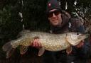 Mickey Bartlett of St Ives Tackle Shop with a 13lb Pike.