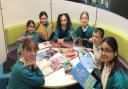 Pupils at Huntingdon Primary School read some of the new books, brought thanks to a large donation.