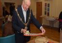 Mayor of Godmanchester Cllr Cliff Thomas looks at crafts from the Philippines at the Rehoboth 40th anniversary celebrations