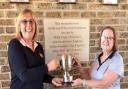 Jubilee Cup winner Marion Goodwill (left) is presented with her prize by the ladies\' captain of St Ives Golf Club, Marie Woodall.
