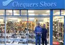 The owner of Chequers Shoes, Rod Galbraith, with Stanislav, a boxer from Ukraine who is living with Mr Galbraith.