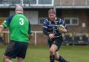 Number 8 Paul Ashbridge makes a break during the defeat to Buckby.