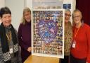 A collage recognising staff and volunteers at the Eaton Socon Vaccination Centre has been loaned to St Neots Museum.