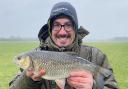 Adam Bartlett with a Chub he caught while fishing ahead of the end of the river season.