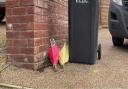 Floral tributes have been left outside a home in The Row, Sutton, where a man was fatally shot last night (March 29).
