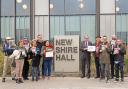Members of People Opposing Woodhurst Incinerator gathered before the meeting in protest against the plans and presented a petition with 4237 signatures.