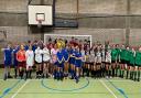 Years 7 and 8 Pupils from schools across Cambridgeshire with their medals from the futsal tournament.