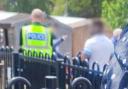 The men were arrested on the grounds of Wyton-on-the-Hill Primary School in Cambridge Square, Wyton, on July 13.