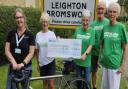 A cheque was presented to delighted representatives of the charities in Leighton Bromswold. From left to right: Emma Sanders (Magpas), Carol Greed (Bromswold Bike Fest), Liz Hardy, Bob Hardy, Di Polley-Coles (Macmillan).