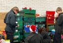 Police cadets in Huntingdonshire helped wrap Christmas presents for families across the area last year. 