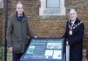 Mayor of Huntingdon, Cllr Phil Pearce, and resident Charles Saunders unveiled the interpretation board
