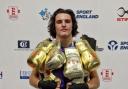 Tobias Taylor with his many awards.