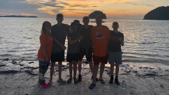 The Hunts Post: The students standing in front of the Bornean sunset The Hunts Post: The students standing in front of the Bornean sunset