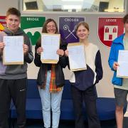 St Ivo students Ben Clinton, Jorja Coxon, Eva Bryant-Hunt and Connor Brookes celebrate opening their GCSE exam results