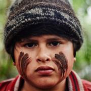 A still from Hunt for the Wilderpeople showing Julian Dennison as Ricky Baker.