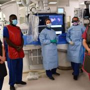 Drs Martin and Heck (middle, blue gowns) led the team during the UK first procedure at Royal Papworth Hospital.