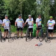 Rotarians from the Rotary Club of St Neots St Marys donning Ukraine shirts for their charity ride.