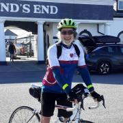 Keith Prendergast, of Eaton Socon, at Land\'s End in Cornwall before his charity cycle to John O\'Groats in Scotland.