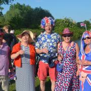 Spectators pitched up at the Regatta Fields in Hemingford Abbots in fancy dress to watch the flotilla.
