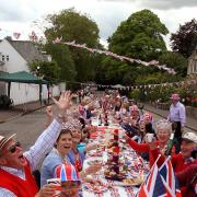 File photo dated 04/06/12 of residents of Murrayfield Drive in Edinburgh, sitting down to a Jubilee street party. Plans are already being set in motion to mark the monarch\'s Platinum Jubilee. Issue date: Friday February 5, 2021.
