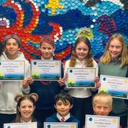 The seven Young Environmentalist finalists from Buckden CE primary school, in St Neots, with their awards.