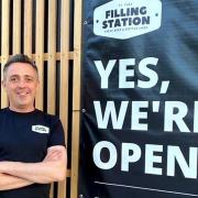 Owner and founder of The Filling Station in St Ives, Matthew Kelly, standing outside the shop.