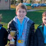 Natty Clifford, Tom Richards and Oliver Albone of Hunts Athletics Club won the gold medal in the U13 boys\' team event.