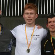 Hunts Athletics Club\'s gold-medal winning U20 men\'s team: Brandon Ballard, Ollie Mills, James Orrell.